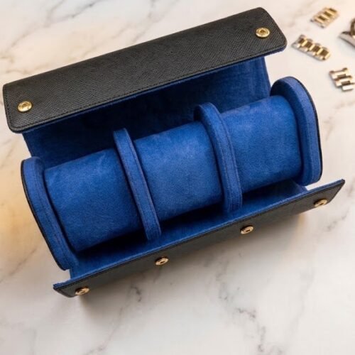 3-slot travel watch roll in navy saffiano genuine leather, open to show three royal blue microfiber cushions